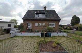 Einfamilienhaus kaufen in 46446 Emmerich, Emmerich am Rhein - Freistehende Immobilie mit großem Grundstück