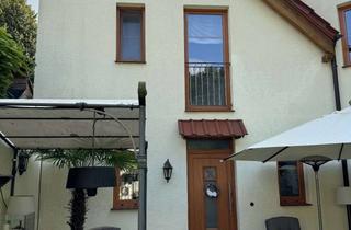 Haus mieten in 32257 Bünde, Charmante Doppelhaushälfte mit Garten, Kamin und Terrasse – bezugsfrei ab 01.05.2026