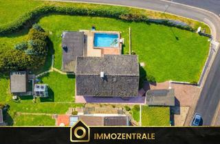 Einfamilienhaus kaufen in 34266 Niestetal, Freistehendes Einfamilienhaus mit großem Garten und Poolbereich in Niestetal