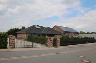 Haus kaufen in 23847 Rethwisch, Provisionsfrei! Ein moderner, gepflegter Winkelbungalow in ruhiger Lage in Rethwisch