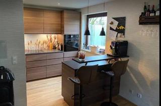 Wohnung kaufen in 61476 Kronberg, Kronberg im Taunus - Modernes Wohnen mit Garten & Terrassen in Kronberg im Ts.