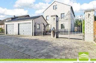 Einfamilienhaus kaufen in 52525 Waldfeucht, Waldfeucht - REIMANN&WOLFF Waldfeucht: Architektur pur. Exklusives Wohnjuwel mit Einliegerwohnung.