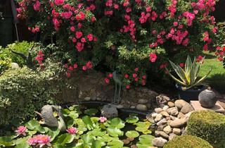 Wohnung kaufen in 86825 Bad Wörishofen, Dieses Kleinod wird Sie begeistern! Möblierte Erdgeschoß-Wohnung mit Gartenanteil und Teich!