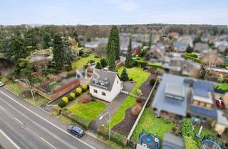 Einfamilienhaus kaufen in 47447 Moers, Freistehendes Einfamilienhaus auf Baugrundstück – Erweiterungs- oder Neubaupotenzial