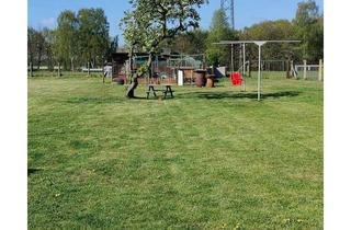 Mehrfamilienhaus kaufen in 19077 Rastow, Großzügiges Mehrfamilienhaus mit drei Wohneinheiten in kinderfreundlicher Lage