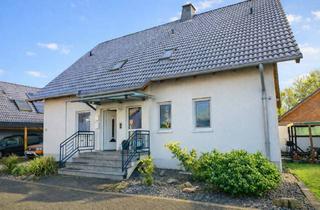 Haus kaufen in 56294 Gierschnach, gepflegte Immobilie mit Entwicklungspotenzial – Zweifamilienhaus mit Einliegerwohnung