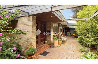 Mehrfamilienhaus kaufen in 26209 Hatten, Attraktive Kapitalanlage oder Eigenheim - Lichtdurchflutetes Zweifamilienhaus mit Gartenoase