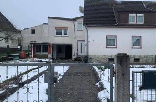 Haus kaufen in 61184 Karben, Haus mit Anliegerwohnung mit 9,5 Zimmern in Karben