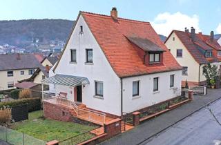 Haus kaufen in 63920 Großheubach, Zweifamilienhaus mit Garten, Nebengebäude und Potenzial in Großheubach
