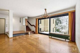 Haus kaufen in 21614 Buxtehude, Rarität: Split-Level-Architektur auf großzügigem Hanggrundstück