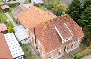 Haus kaufen in 26736 Krummhörn, Modernisierter Resthof mit Einliegerwohnung, Frisörstudio, Werkstatt und Garage in Warftenlage