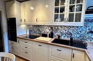 Wohnung kaufen in 76532 Oos, Bezugsfertige 3-Zimmer-Wohnung mit Kamin, Einbauküche und Carport