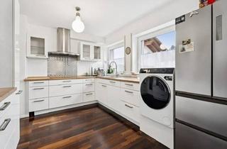 Wohnung kaufen in 88450 Berkheim, Großzügige, energetisch sanierte Gartenwohnung mit Terrasse und Garage in Berkheim