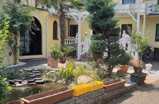 Wohnung kaufen in 53879 Euskirchen, Euskirchen - Erdgeschosswohnung mit EBK Insel und Garage +100 qm Wellnessoase