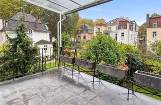 Wohnung kaufen in 53173 Bonn, Bonn - Stilvoll wohnen im denkmalgeschützten Altbau - 4-Zimmer-Refugium mit Terrasse und Blick ins Grüne!