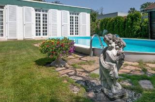 Haus kaufen in 63150 Heusenstamm, Heusenstamm - Freiraum genießen: Barrierefreies Zuhause mit Garten