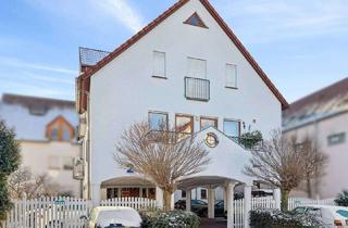 Wohnung kaufen in 64546 Mörfelden-Walldorf, 2-Zimmer-Maisonettewohnung mit großem Gartenanteil in Mörfelden