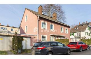 Doppelhaushälfte kaufen in 61352 Bad Homburg, Gepflegte Doppelhaushälfte mit besonderer Architektur, Garten, Terrasse, Garage und viel Platz