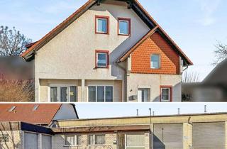 Haus kaufen in 34434 Borgentreich, Wohnen und Arbeiten unter einem Dach: Zweifamilienhaus, Bürofläche und Gewerbehalle in Borgentreich