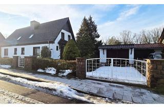 Doppelhaushälfte kaufen in 06862 Roßlau, Ruhig wohnen in Roßlau: Doppelhaushälfte mit großem Grundstück, Pool und vielseitigem Potenzial