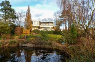 Villa kaufen in 26725 Herrentor, Exklusive Flachdach-Villa mit Wellnessbereich und parkähnlichem Garten