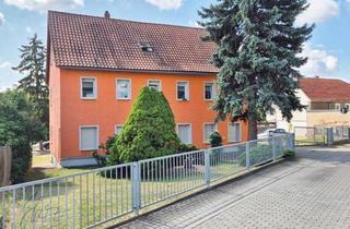 Mehrfamilienhaus kaufen in Schulgasse, 01589 Riesa, ***JETZT AN DIE ALTERSVORSORGE DENKEN - RENDITEOBJEKT FÜR VERMIETER IN RIESA*** Mehrfamilienhaus mit 4 Wohneinheiten, Garagen, Stellflächen und Garten in ruhiger, städtischer Randlage