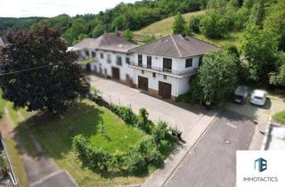 Einfamilienhaus kaufen in 55452 Guldental, Einfamilienhaus mit umlaufendem Balkon, zwei großen Maxi-Garagen, Garten und unverbaubarem Weitblick