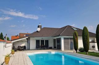 Haus kaufen in 79206 Breisach, Mediterraner Bungalow mit Pool & Einliegerwohnung