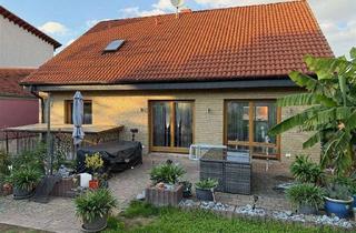 Haus kaufen in 55234 Gau-Heppenheim, Schönes EFH (Renolit) mit Keller, Garage und Garten