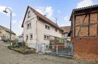 Einfamilienhaus kaufen in 35321 Laubach, Familienfreundliches Einfamilienhaus mit Nebengebäude und zwei Garagen