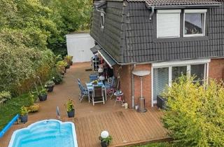 Haus kaufen in 21629 Neu Wulmstorf, Neu Wulmstorf - Attraktives Reihenendhaus mit Außenpool in Neu Wulmstorf