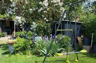 Wohnung kaufen in 53913 Swisttal, Swisttal - Familienfreundliches Immobilienpaket: 3 Wohneinheiten mit Garten