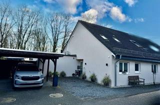Doppelhaushälfte kaufen in 46514 Schermbeck, Moderne Doppelhaushälfte mit hochwertiger Ausstattung und Carport in familienfreundlicher Wohnlage!