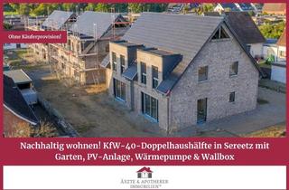 Doppelhaushälfte kaufen in 23611 Bad Schwartau, Nachhaltig wohnen!KfW-40-Doppelhaushälfte inSereetz mit Garten, PV-Anlage,Wärmepumpe & Wallbox