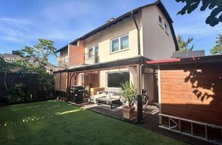 Doppelhaushälfte kaufen in 65779 Kelkheim, Modernisierte Doppelhaushälfte mit Garten, Terrasse und Whirlpool