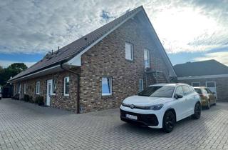 Wohnung kaufen in 26802 Moormerland, Neuwertige Obergeschoßwohnung in idyllischer Wiekenlage