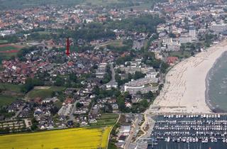 Haus kaufen in 23743 Grömitz, Wohnen auf drei Ebenen: Reihenmittelhaus mit ausgebautem Dachgeschoss