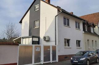 Einfamilienhaus kaufen in 68229 Friedrichsfeld, Modernisiertes Einfamilienhaus mit Klimaanlage, großem Hof, Terrasse und elektrischer Toreinfahrt