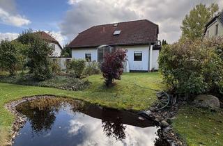Einfamilienhaus kaufen in 18182 Bentwisch, Großes Einfamilienhaus mit 5 Zimmern, Teich, Garage, Wintergarten