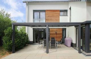 Anlageobjekt in 85757 Karlsfeld, Exquisites Wohnerlebnis: Einfamilienhaus mit luxuriöser Ausstattung und idyllischem Garten