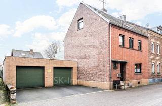 Doppelhaushälfte kaufen in 50226 Frechen, Frechen-Bachem, gemütliche Altbau-Doppelhaushälfte mit zwei Garagen.