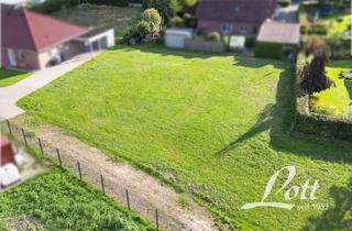 Immobilie kaufen in 26689 Apen, ++ Attraktives Hintergrundstück in zentraler Lage von Apen – Zweigeschossige Bebauung zulässig ++