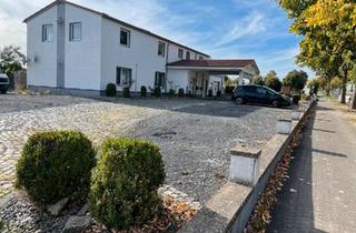 Haus kaufen in 37154 Northeim, Northeim - Wohnhaus 2 x Wohnungen mit Gewerbefläche Grundstück 2343m²
