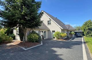 Einfamilienhaus kaufen in 25368 Kiebitzreihe, Courtagefrei! Großzügiges Einfamilienhaus mit Anbau