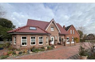 Haus mieten in 1. Südwieke 238, 26817 Rhauderfehn, Wohnen am See: Erdgeschosswohnung mit direktem Zugang zum See in einer Doppelhaushälfte