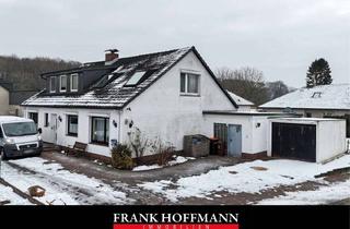 Haus kaufen in 24641 Sievershütten, Sanierungsbedürftiges Zweifamilienhaus auf großzügigem Grundstück in Sievershütten