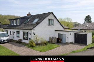 Haus kaufen in 24641 Sievershütten, Sanierungsbedürftiges Zweifamilienhaus auf großzügigem Grundstück in Sievershütten