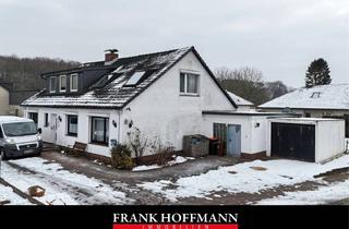 Einfamilienhaus kaufen in 24641 Sievershütten, Sanierungsbedürftiges Zweifamilienhaus auf großzügigem Grundstück in Sievershütten