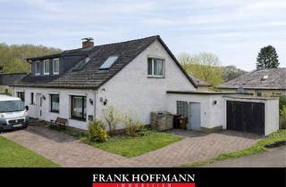 Einfamilienhaus kaufen in 24641 Sievershütten, Sanierungsbedürftiges Zweifamilienhaus auf großzügigem Grundstück in Sievershütten