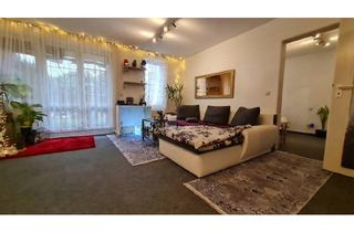 Wohnung kaufen in 76149 Karlsruhe, Attraktive Kapitalanlage! Vermietete 2-Zimmer-EG-Wohnung mit Terrasse & TG-Stellplatz in Neureut